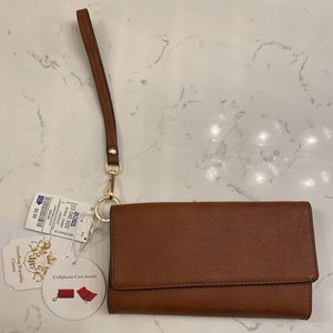 Clutch wallet that holds phone and lipgloss